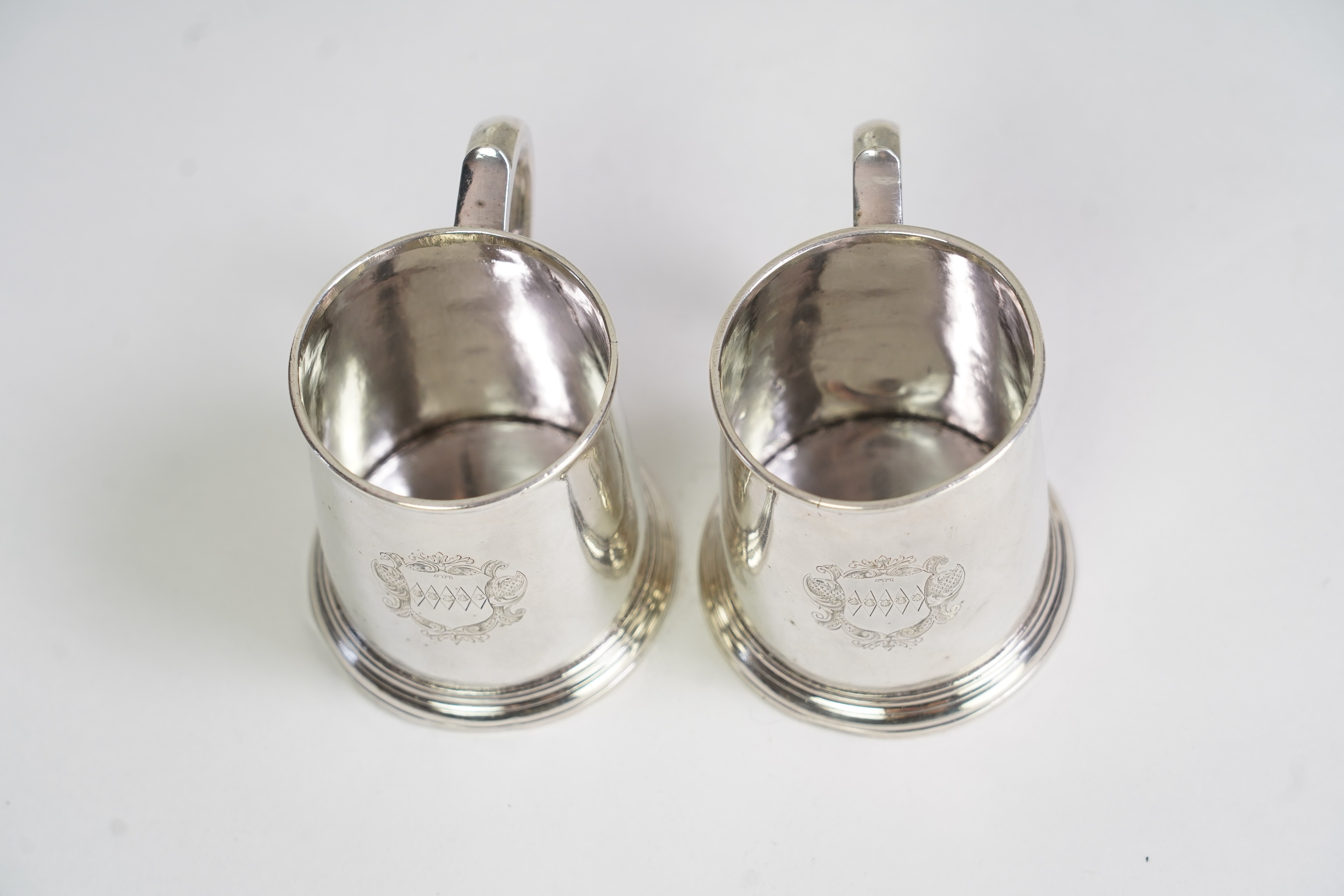 A pair of George I silver small mugs, by Thomas Morse